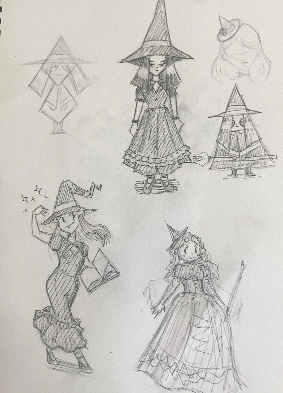 Pencil page exploring witch costumes, hats, proportions, and poses